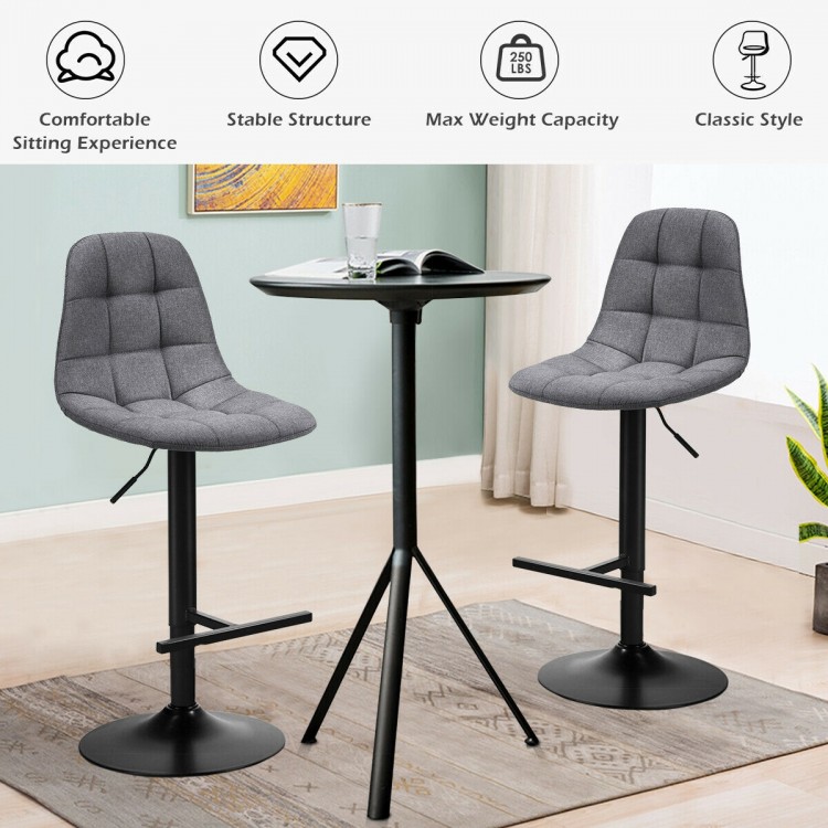 Gray adjustable bar stool featuring a comfortable linen seat and sturdy round base, ideal for dining and social spaces.