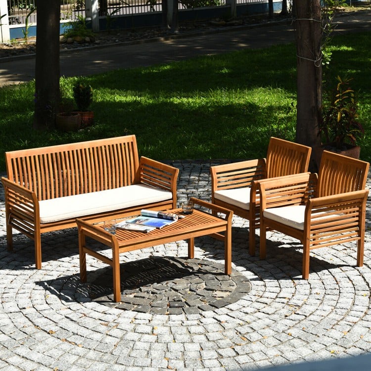 4-piece outdoor acacia wood sofa furniture set with cushions, perfect for patio or garden relaxation.