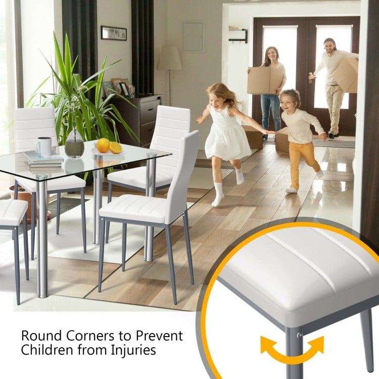 5-piece dining set featuring a clear glass table and 4 PVC leather chairs with round corners for safety in modern.