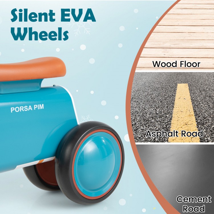 Close-up of the blue baby balance bike's silent EVA wheels, designed for safe indoor and outdoor riding.