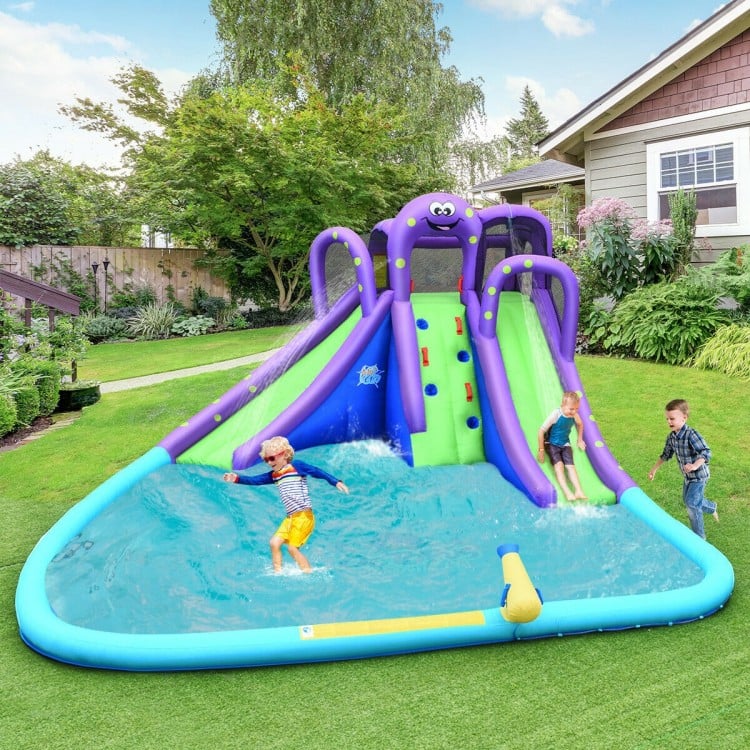 Inflatable water park with a large splashing pool, tall slides, and water cannon for backyard summer fun.