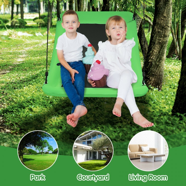 Kids enjoying the 60-inch green platform tree swing, perfect for parks and backyards, supporting up to 700 lbs.