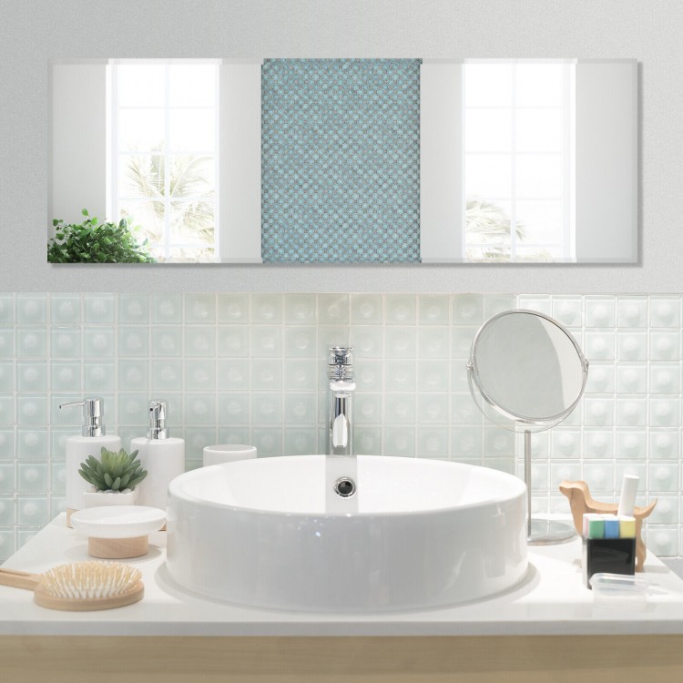 Frameless full-length mirror in a modern bathroom setting, ideal for checking outfits and enhancing decor.