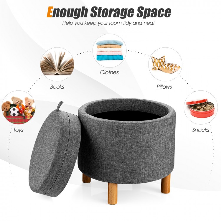 Round gray fabric storage ottoman featuring a soft padded seat and solid pine legs, perfect for stylish storage.