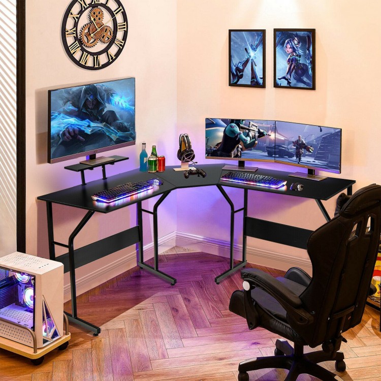 L-shaped black computer desk with monitor stand, ideal for dual setups, ergonomic design, and space-saving features.