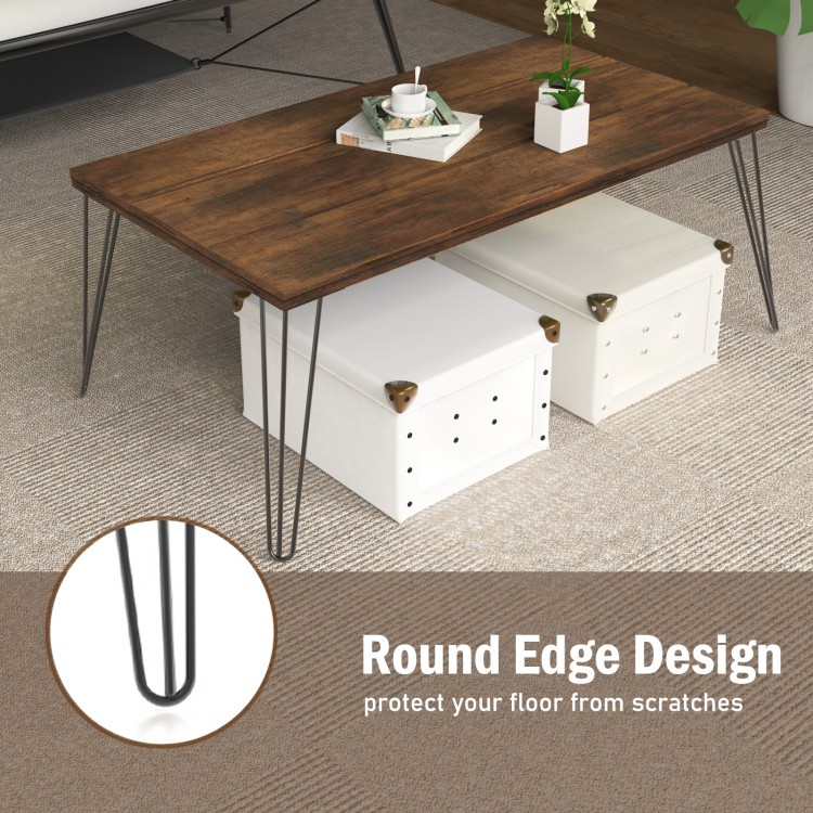 Wooden rectangular coffee table with metal legs, 43.5" x 23.5", featuring round edge design to protect floors.