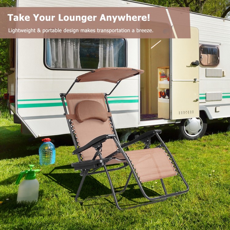 Folding recliner lounge chair with adjustable sun shade canopy and cup holder, perfect for outdoor relaxation and.