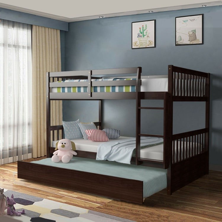 Full over full bunk bed in brown wood with trundle, featuring guardrails and sturdy ladder, ideal for kids' rooms.