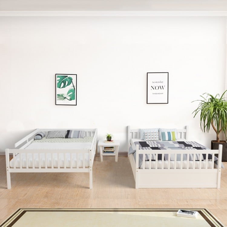 Full over full bunk bed in white wood with trundle, featuring sturdy slats and modern design for kids' or guest rooms.