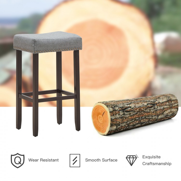 Gray nailhead saddle bar stool showcasing solid rubberwood legs and ergonomic design, perfect for stylish seating in.