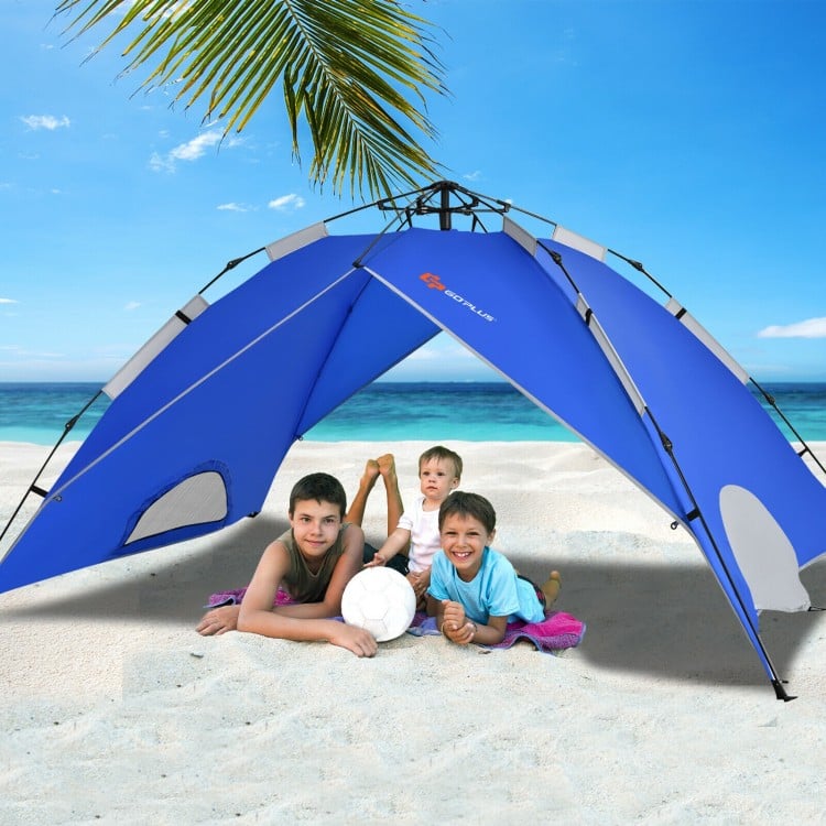 Blue 2-in-1 pop-up camping tent for 4 people, offering sun protection and waterproof features, ideal for beach outings.