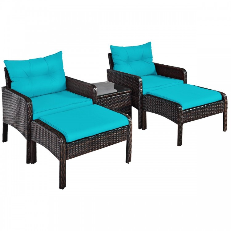 Two single sofas with turquoise cushions and a tea table, part of a 5 pcs patio rattan furniture set for outdoor spaces.