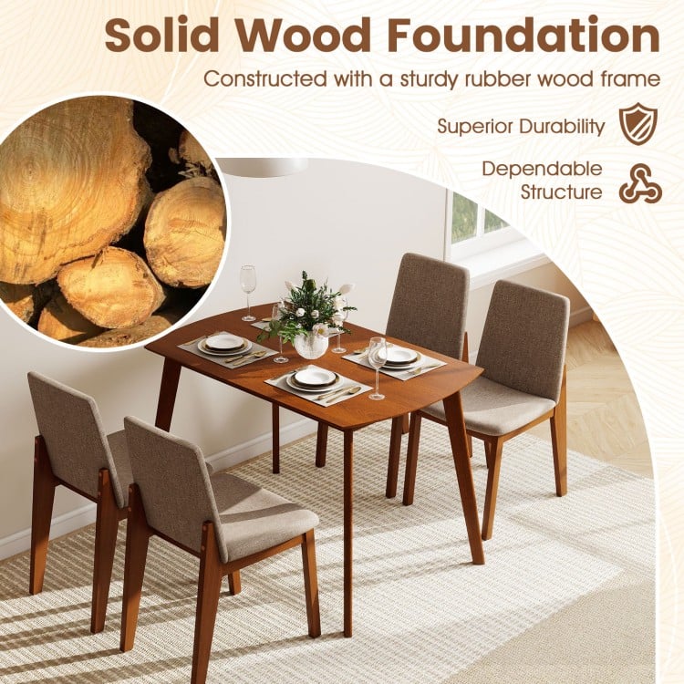5-piece kitchen table set with light brown upholstered chairs, featuring a sturdy rubber wood frame for stability and comfort.