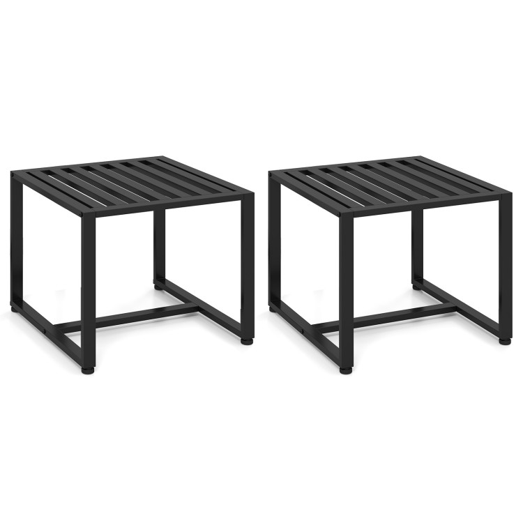 Set of two black coffee tables with a minimalist design, perfect for modern living rooms or office lounges.