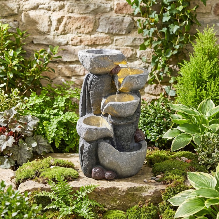 5-tier outdoor water fountain with LED lights, resin construction, cascading design for relaxing ambiance in gardens.