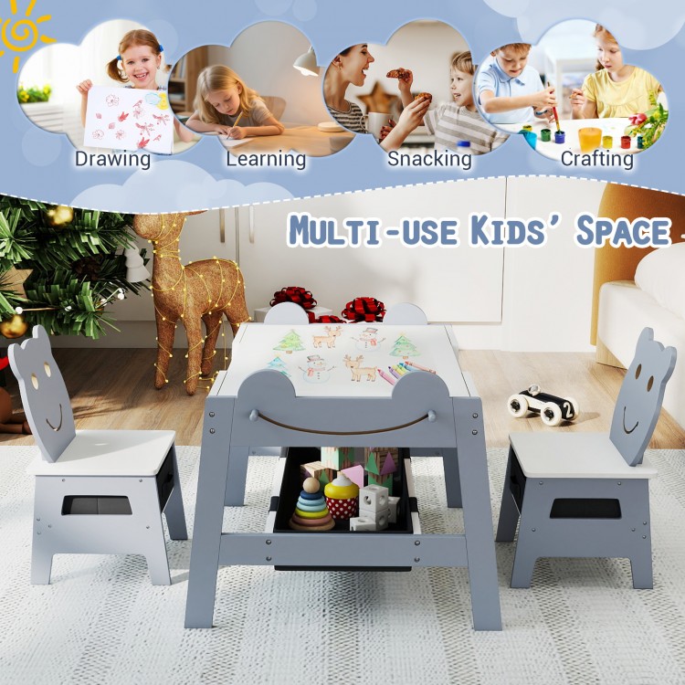 Cute grey 5-in-1 toddler table with reversible chalkboard, two chairs, and storage for arts and crafts activities.