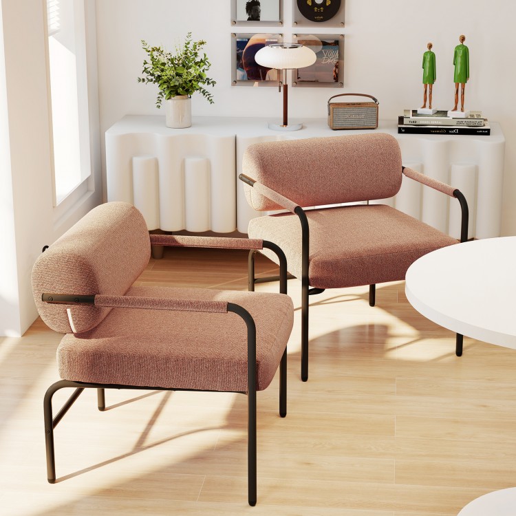 Two brown velvet upholstered accent chairs with cylindrical backrests and metal armrests, ideal for living room comfort.