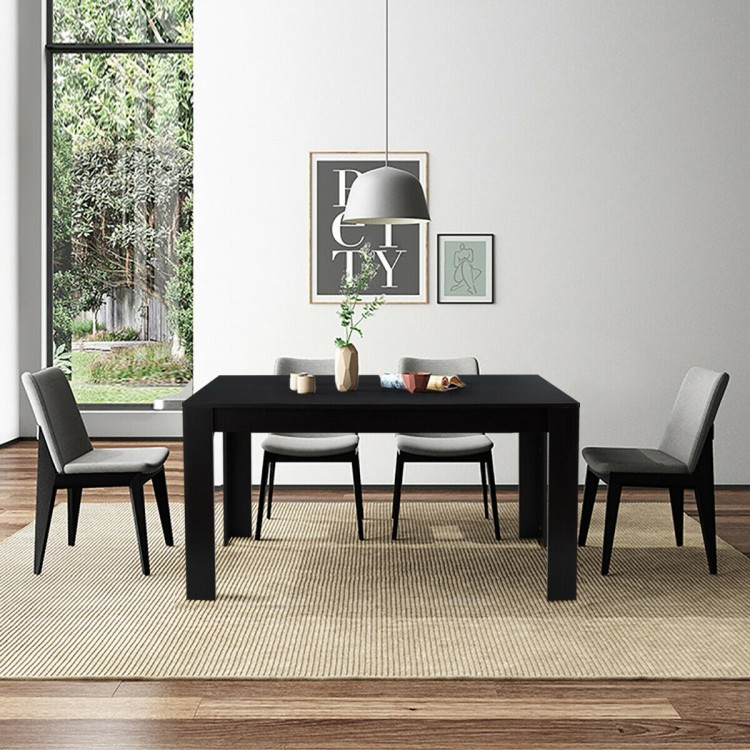 Modern 63-inch black dining table with spacious surface and four sturdy legs, perfect for kitchen or dining room use.