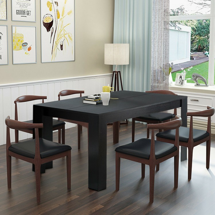 Modern 63-inch black dining table with spacious surface and sturdy wood legs, perfect for kitchen or dining room use.