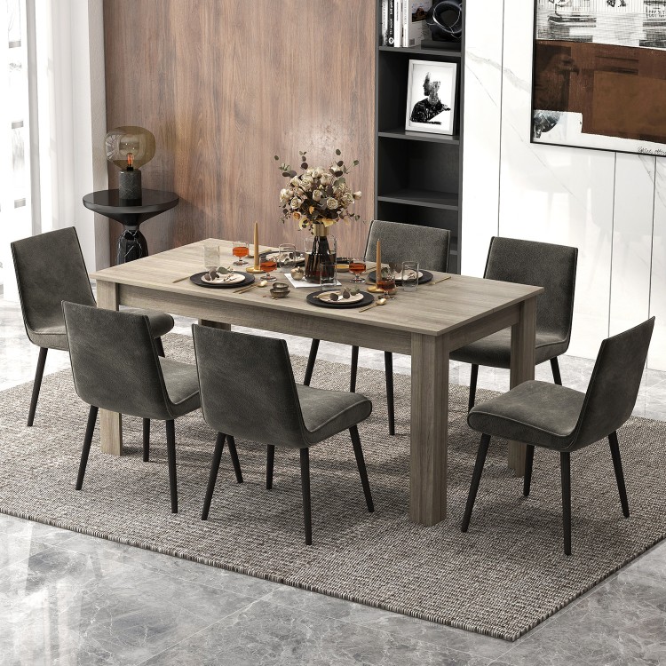 Rectangular light gray dining table with six chairs, perfect for kitchen or dining room use, featuring a spacious.
