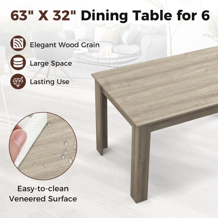 Rectangular 63" light gray dining table with spacious surface, easy-to-clean veneer, and sturdy wood legs for stability.