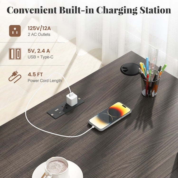 L-shaped dark gray computer desk with built-in charging station, 2 AC outlets, USB, and Type-C ports for convenient use.