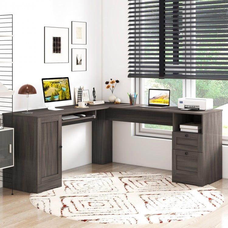 L-shaped dark gray computer desk with ample workspace, charging station, and pull-out keyboard tray for organized use.