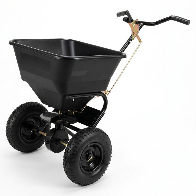 Walk-behind broadcast spreader with a 66 lbs capacity, featuring 13-inch all-terrain tires for efficient lawn and garden tasks.