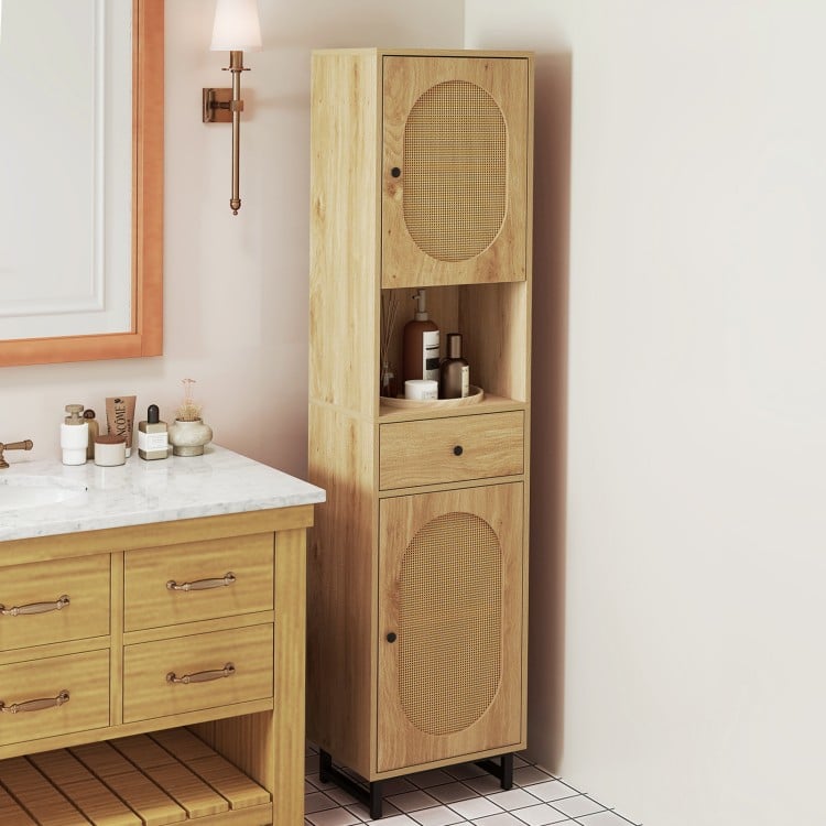 Tall bathroom cabinet with natural finish, PE rattan doors, and ample storage, perfect for small spaces.