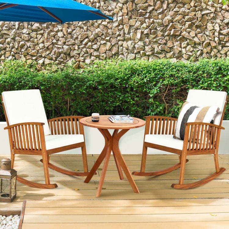 Round solid wood coffee side bistro table with X-shaped legs, varnished for waterproofing, perfect for outdoor spaces.