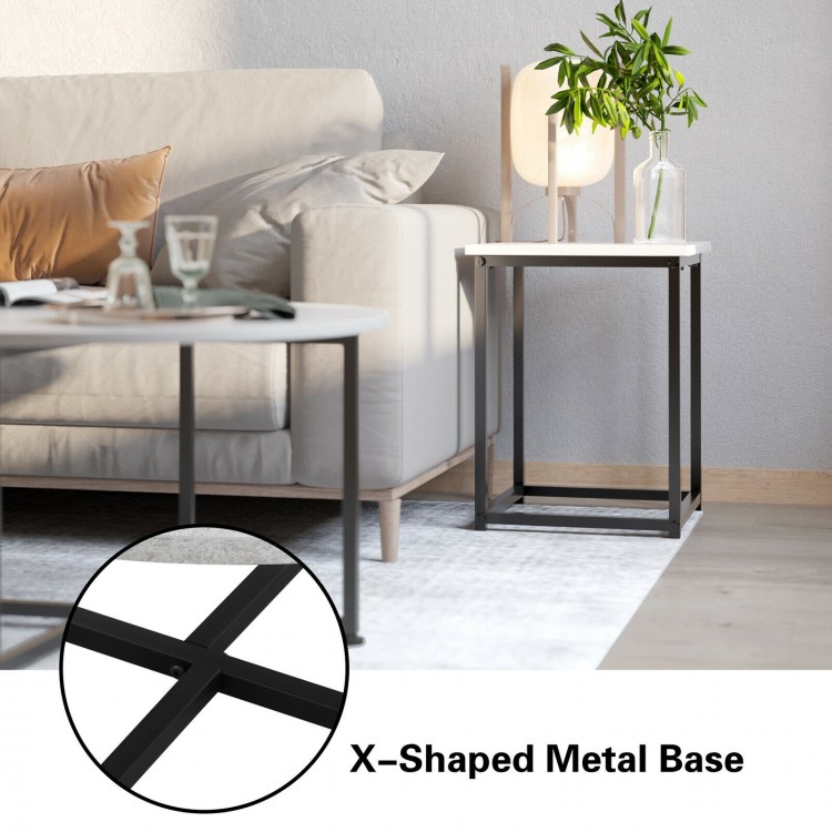 Round coffee table with X-shaped metal base and faux marble top, perfect for living room or office use.