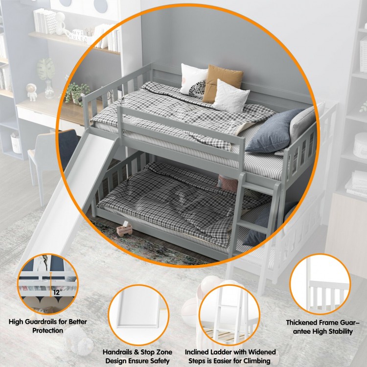 Twin over twin gray wooden bunk bed with slide, inclined ladder, and high guardrails for kids' safety and fun.