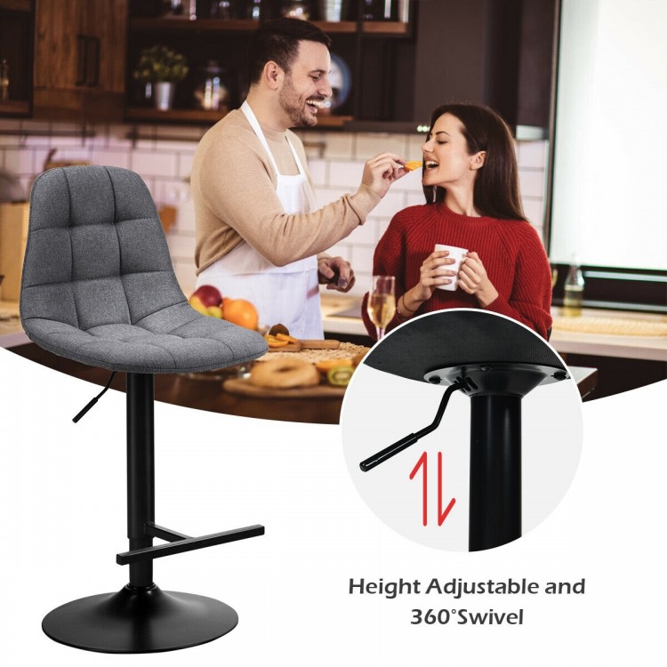 Adjustable gray linen bar stool with T-shaped footrest and 360-degree swivel, perfect for kitchens and cafes.