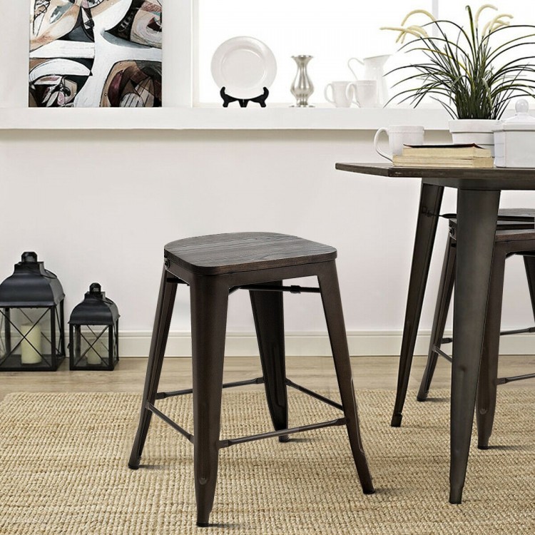 Industrial metal counter stool with elmwood seat, featuring a sturdy steel frame, perfect for dining or pub settings.
