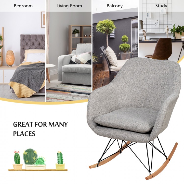 Gray accent upholstered fabric rocking armchair with beech wood legs, ideal for living room, bedroom, or study.