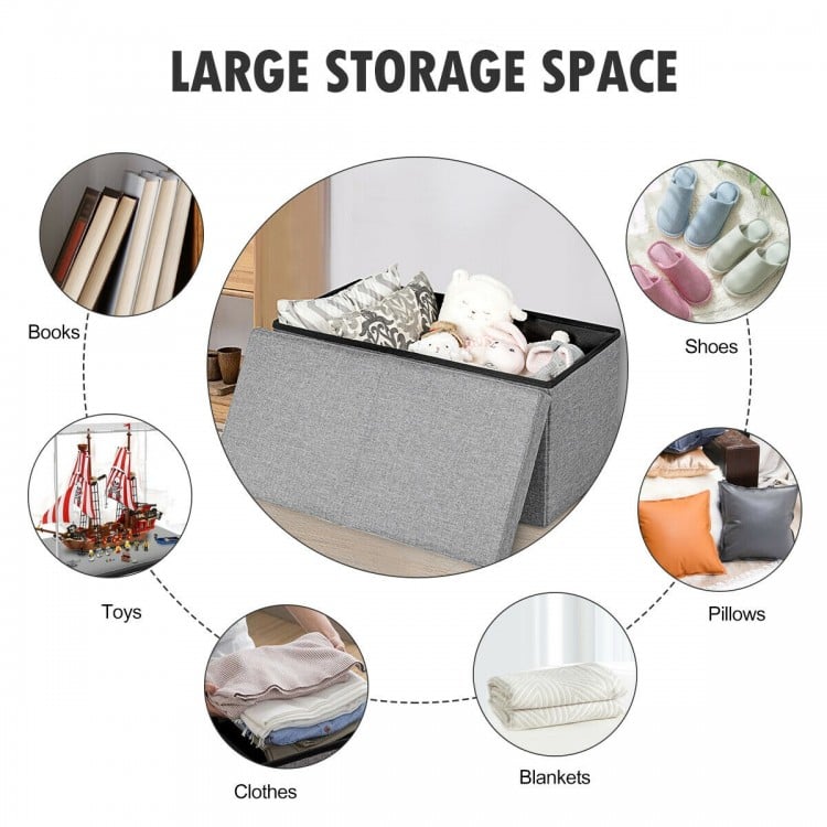 Light gray folding storage ottoman with lift top, offering large storage space for clothes, blankets, and shoes.
