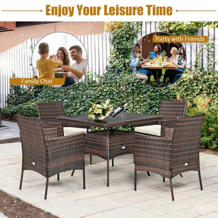 Outdoor 5-piece dining table set showcasing 4 single sofas with cushions around a stylish glass-top table for outdoor.