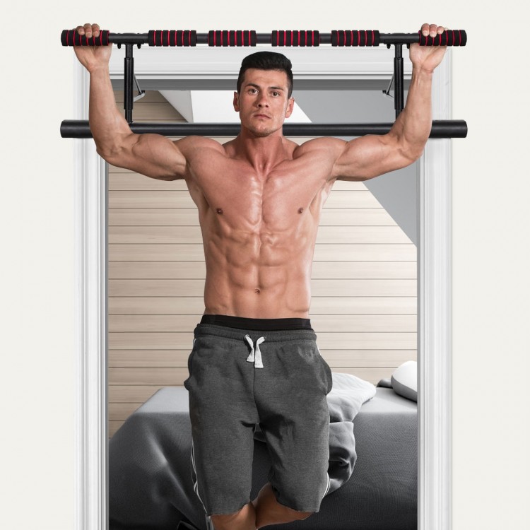Foldable pull-up bar with foam grip, shown in use for chin-ups, designed for home gym convenience and easy storage.