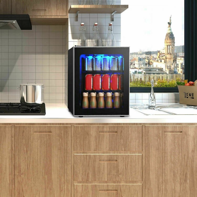 Mini beverage refrigerator with glass door, 60-can capacity, LED light, ideal for small kitchens and offices.