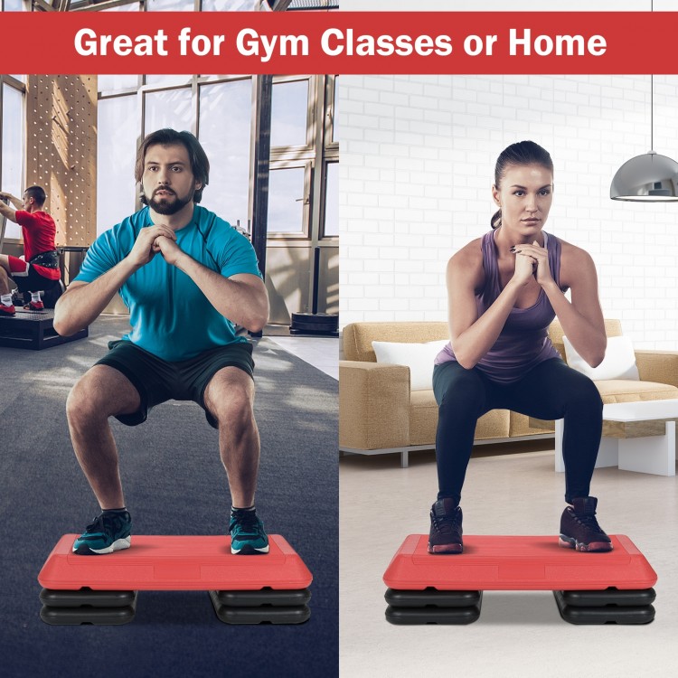 Adjustable 29-inch red aerobic stepper platform with detachable risers for versatile workouts at home or gym classes.