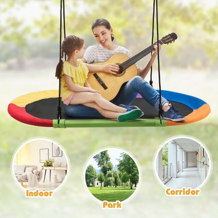Oval 60-inch multicolor saucer swing for indoor and outdoor use, adjustable height, supports up to 700lbs for multiple.