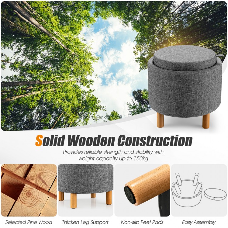 Round gray fabric storage ottoman with wooden tray, solid pine legs, and non-slip pads for versatile use in any room.
