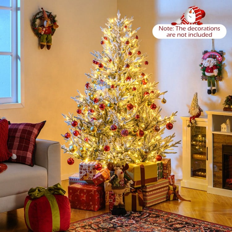 6-foot pre-lit artificial Christmas tree with snow flocking and warm white LED lights, perfect for festive home.