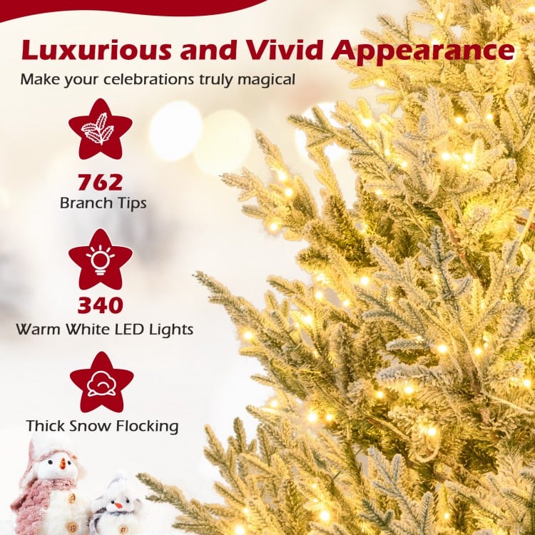 6-foot pre-lit artificial Christmas tree with 762 branch tips, thick snow flocking, and 340 warm white LED lights for.