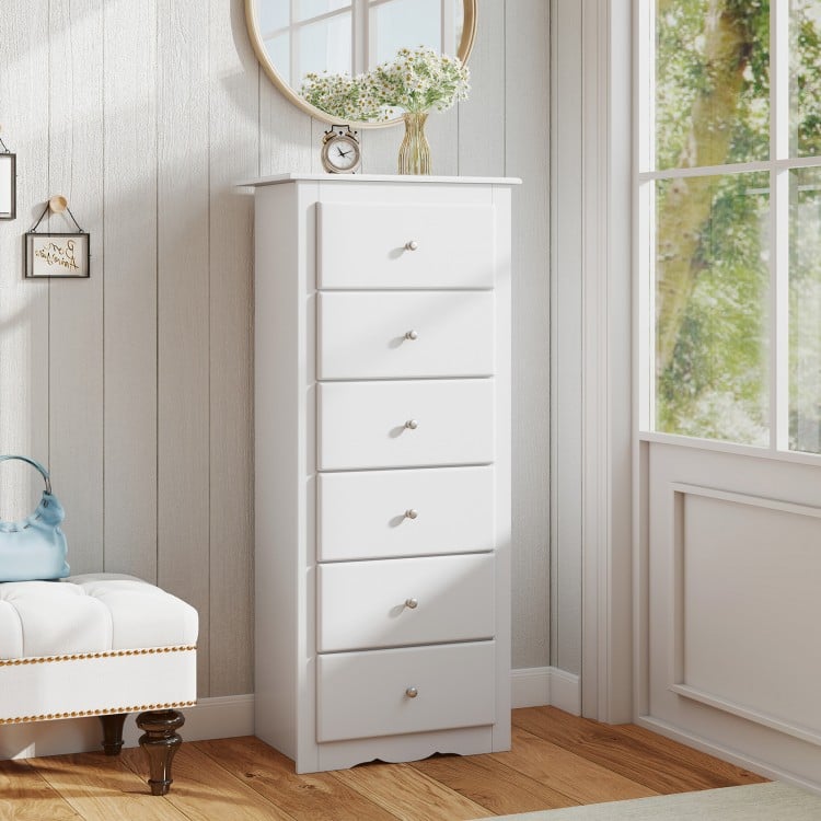White 6-drawer chest dresser with elegant design, smooth metal glides, and spacious top for bedroom or living room.