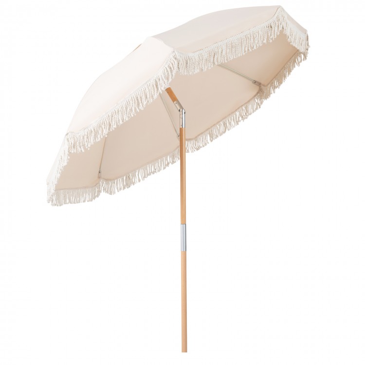 Side view of a 6 feet white patio umbrella with fringe and wood pole, showcasing its elegant design for outdoor spaces.