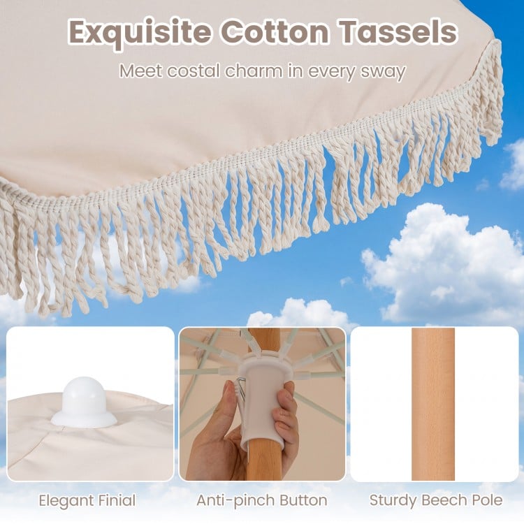 Close-up of the exquisite cotton tassels and sturdy beech pole on a 6 feet white patio umbrella with fringe.