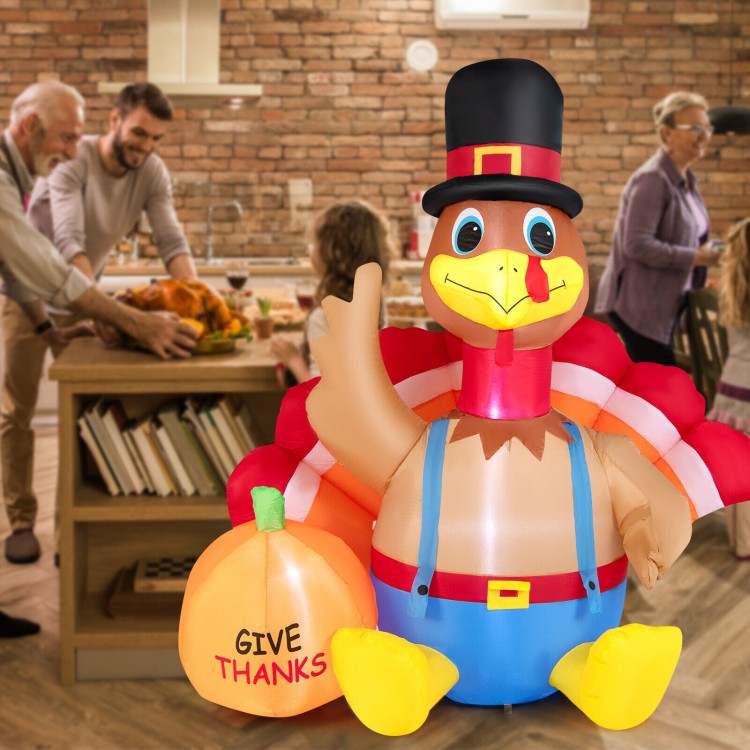 Inflatable 6-foot Thanksgiving turkey with pumpkin and LED lights, perfect for outdoor fall harvest decoration.