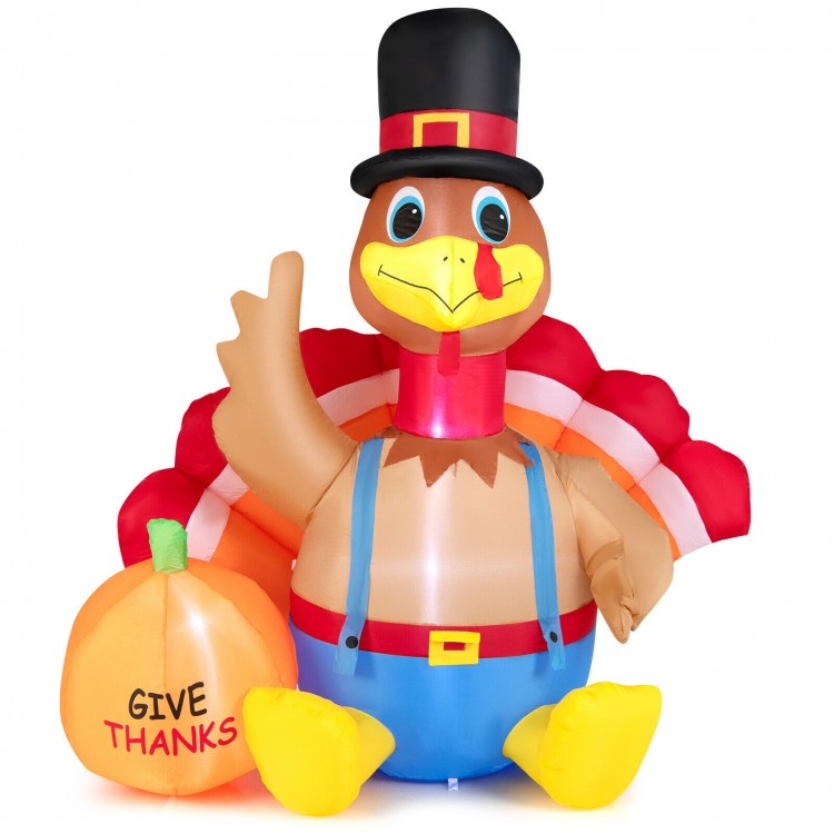 Inflatable turkey with pumpkin decoration, 6 feet tall, featuring LED lights for festive outdoor Thanksgiving display.