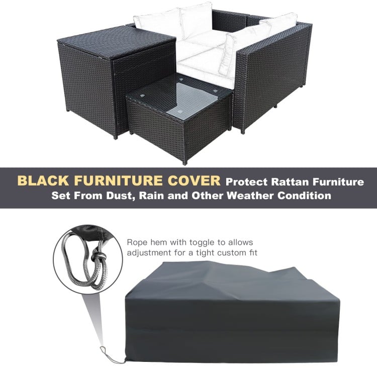 Outdoor wicker furniture set with black furniture cover, protecting from dust and weather conditions.